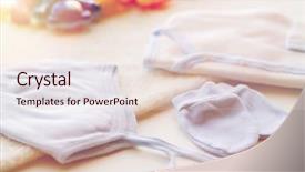  Presentation with baby clothes - Amazing slide set having baby clothes and object concept - close up of white cardigan mittens and hat with towel for newborn boy backdrop and a lemonade colored foreground