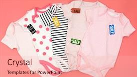  Presentation with baby clothes - Presentation having onesie - baby clothes and wooden cubes background and a lemonade colored foreground