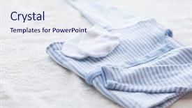  Presentation with baby clothes - Slide set consisting of baby clothes babyhood motherhoods and object concept - close up of blue bodysuit mittens and towel for newborn boy background and a sky blue colored foreground