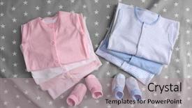  Presentation with baby clothes - Beautiful theme featuring baby clothes on light background backdrop and a coral colored foreground