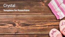  Presentation with baby clothes - Slide deck consisting of baby clothes on wooden background background and a tawny brown colored foreground