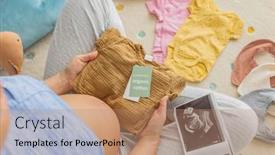  Presentation with baby ultrasound - Presentation theme consisting of baby-clothing-in-organic-cotton background and a coral colored foreground