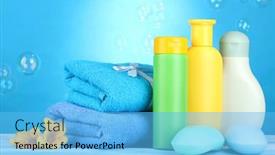  Presentation with cosmetics - Slide set featuring baby cosmetics towels and soap on wooden table on blue background background and a light blue colored foreground
