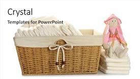  Presentation with baby toy - Beautiful presentation featuring baby diapers in wicker basket backdrop and a white colored foreground