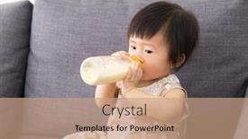  Presentation with baby milk - Audience pleasing PPT theme consisting of baby girl holding milk bottle and sitting on sofa backdrop and a coral colored foreground