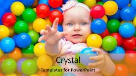  Presentation with baby girl announcement - Presentation design featuring baby girl lying down in colourful balls and reaching hand to go background and a gold colored foreground