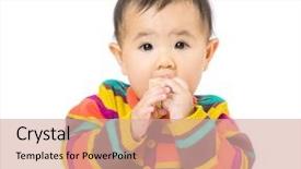  Presentation with baby toy - Presentation theme enhanced with baby girl put toy block into mouth background and a coral colored foreground