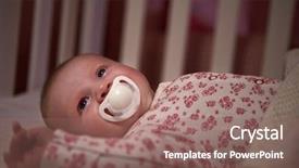  Presentation with baby girl - Audience pleasing theme consisting of awake - baby girl with pacifier lying backdrop and a violet colored foreground
