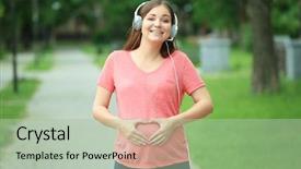  Presentation with music headphones - Beautiful presentation theme featuring baby hearing - pregnant woman listening to music backdrop and a mint green colored foreground