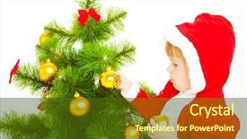  Presentation with baby tree - Audience pleasing presentation consisting of baby in a red santa costume decorating christmas tree backdrop and a tawny brown colored foreground