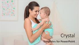  Presentation with mother and baby - Amazing slide deck having baby in towel after bathing backdrop and a soft green colored foreground