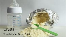  Presentation with baby bottle formula - Presentation theme consisting of baby milk formula with spoon background and a soft green colored foreground