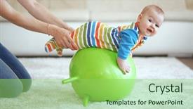  Presentation with gym ball - Presentation design having baby playing with gymnastic ball background and a seafoam green colored foreground
