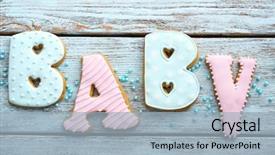  Presentation with babyshower - Audience pleasing PPT theme consisting of baby shower cookies on wooden backdrop and a light blue colored foreground
