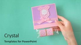  Presentation with greeting card - Cool new presentation theme with baby shower invitations - woman holding greeting card backdrop and a seafoam green colored foreground