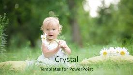  Presentation with baby sitting - Cool new theme with spring flowers girl - baby sitting on green grass backdrop and a mint green colored foreground