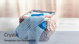  Presentation with baby fashion - Slide deck with baby socks in wicker box background and a seafoam green colored foreground