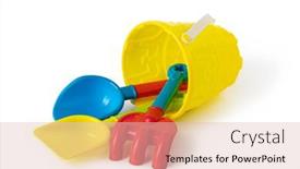  Presentation with baby toy - Cool new PPT theme with baby-toy-bucket-and-shovel backdrop and a lemonade colored foreground