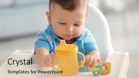  Presentation with baby bottle - PPT theme having baby with bottle of water background and a coral colored foreground