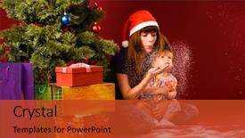  Presentation with baby tree - Beautiful presentation design featuring baby with her mother are blowing snow flakes near christmas tree backdrop and a red colored foreground