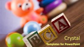  Presentation with baby toy - Beautiful PPT theme featuring baby world toy collection on on wooden background backdrop and a tawny brown colored foreground