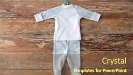  Presentation with clothing - Audience pleasing slide set consisting of babyhood-and-clothing-concept-baby backdrop and a tawny brown colored foreground