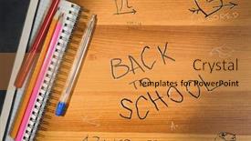  Presentation with school desk - PPT theme with back-to-school-writing background and a gold colored foreground