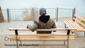  Presentation with man sitting bench - Cool new theme with back view picture of young african man wearing hat and scarf sitting on a bench on the street backdrop and a coral colored foreground