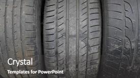  Presentation with tire - Audience pleasing PPT theme consisting of background-with-the-image backdrop and a dark gray colored foreground