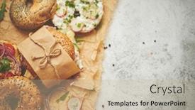  Presentation with healthy breakfast - Audience pleasing PPT theme consisting of bagels-with-italian-ham-prosciutto backdrop and a mint green colored foreground