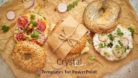  Presentation with take - Slide set featuring bagels-with-italian-ham-prosciutto background and a gold colored foreground