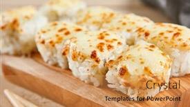  Presentation with asian chopsticks - Presentation having baked-shrimp-rolls-on-wooden background and a gold colored foreground