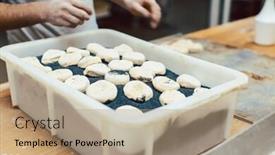  Presentation with black seed - Slide set with baker-putting-black-poppy-seed background and a coral colored foreground