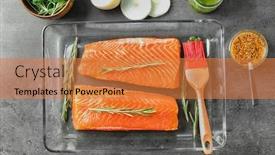  Presentation with salmon dish - Audience pleasing slide deck consisting of baking dish with fresh raw salmon fillet ready for marinating on table backdrop and a gold colored foreground