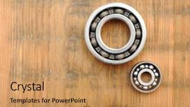  Presentation with steel - Audience pleasing PPT theme consisting of ballbearing - steel ball bearings on wooden backdrop and a coral colored foreground