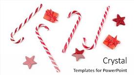  Presentation with candy canes - Audience pleasing slide deck consisting of balls red ball - christmas candy canes and decor backdrop and a pink colored foreground
