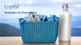  Presentation with laundry detergent - PPT theme having basket with clothes and laundry detergent on table outdoors background and a sky blue colored foreground