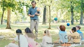  Presentation with children talking - Slide set consisting of bearded-teacher-holding-planet-model background and a soft green colored foreground