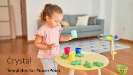  Presentation with frogs - PPT theme having beautiful-blond-toddler-girl-playing background and a coral colored foreground