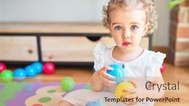  Presentation with infant - Audience pleasing presentation theme consisting of beautiful caucasian infant playing with toys at colorful playroom happy and playful wth colorful balls at kindergarten backdrop and a coral colored foreground