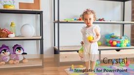  Presentation with infant - Presentation theme enhanced with beautiful caucasian infant playing with toys at colorful playroom happy and playful wth colorful balls at kindergarten background and a coral colored foreground