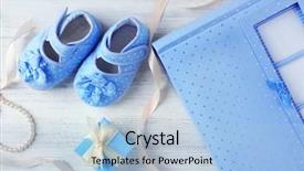  Presentation with christening - Beautiful theme featuring beautiful composition with baby booties backdrop and a light blue colored foreground