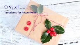  Presentation with cristmas - Theme consisting of beautiful cristmas gift with european holly ilex aquifolium on wooden background background and a sky blue colored foreground