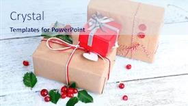  Presentation with cristmas - Audience pleasing presentation theme consisting of beautiful cristmas gifts with european holly ilex aquifolium on wooden background backdrop and a sky blue colored foreground