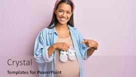  Presentation with baby shoes - Amazing PPT theme having beautiful-hispanic-woman-expecting backdrop and a soft green colored foreground