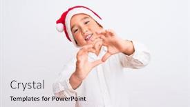  Presentation with romantic christmas - Amazing PPT theme having beautiful kid boy wearing christmas santa hat standing over isolated white background smiling in love doing heart symbol shape with hands romantic concept backdrop and a white colored foreground