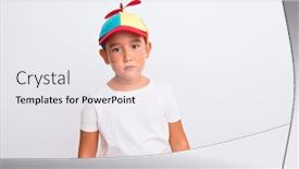  Presentation with propeller - Presentation having beautiful kid boy wearing fanny colorful cap with propeller over isolated white background with serious expression on face simple and natural looking at the camera background and a white colored foreground