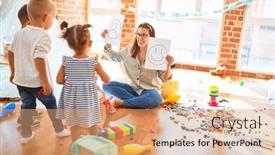 Presentation with toddlers - Cool new presentation with beautiful psychologist and group of toddlers make therapy using emotions emojis around lots of toys at kindergarten backdrop and a coral colored foreground