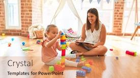  Presentation with building blocks - Theme enhanced with beautiful psycologist and blond toddler girl doing therapy building tower using plastic blocks at kindergarten background and a coral colored foreground