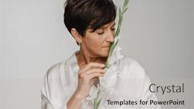  Presentation with flower woman - PPT theme consisting of beautiful-senior-woman-with-short background and a light gray colored foreground